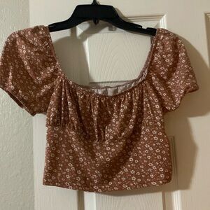 Rust color and cream flower crop top